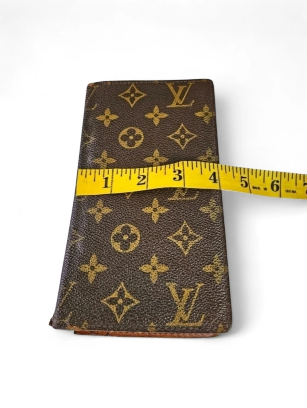 Louis Vuitton Vintage LV Monogram Bi Fold Wallet in Coated Canvas and Leather